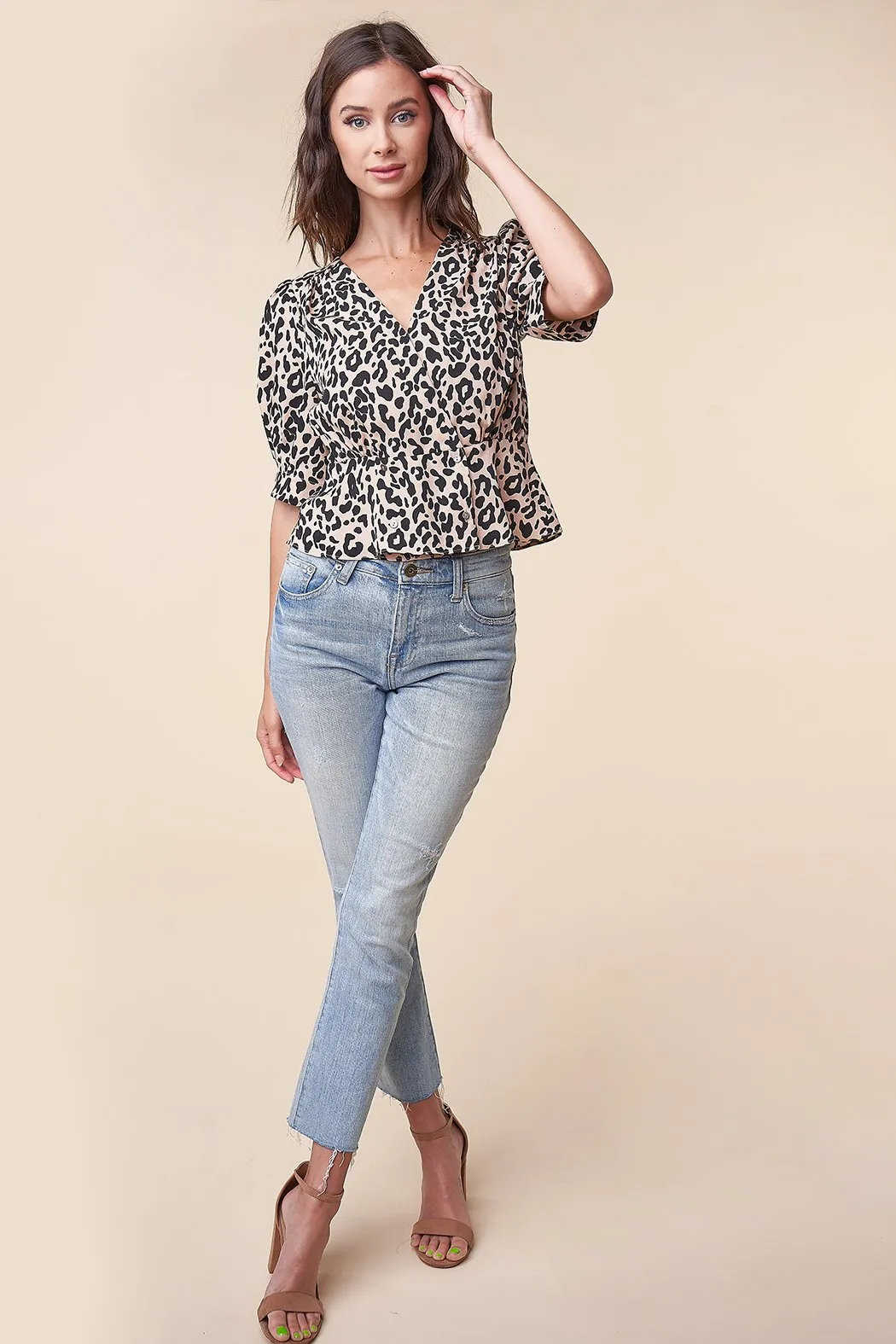 Cale Leopard Peplum Top