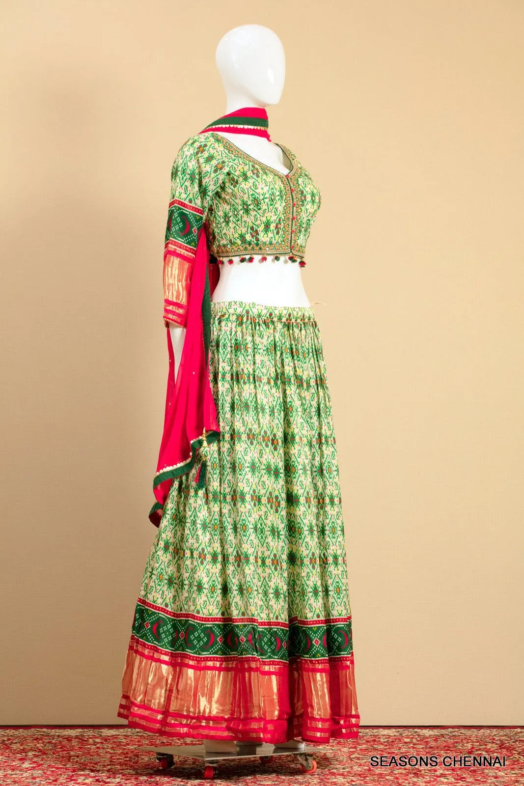 Cream with Green Printed, Mirror, Banaras, Beads and Pearl work Crop Top Lehenga